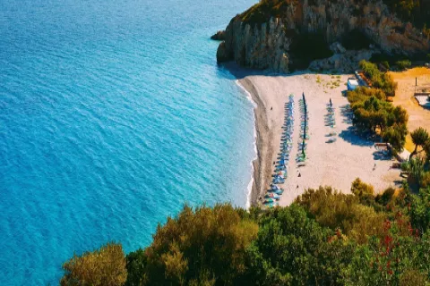Kaladakia Beach in Samos with emerald waters and dramatic rocky landscape near