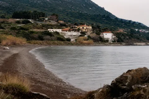Petalides Beach (Kourountere) on Samos with a pebble shore and clear blue waters