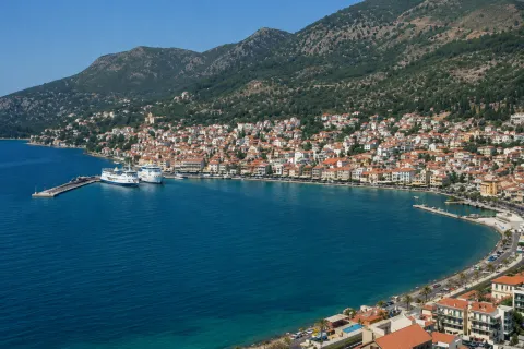 Panoramic view of Vathy, Samos, with the harbor and the town built around the bay